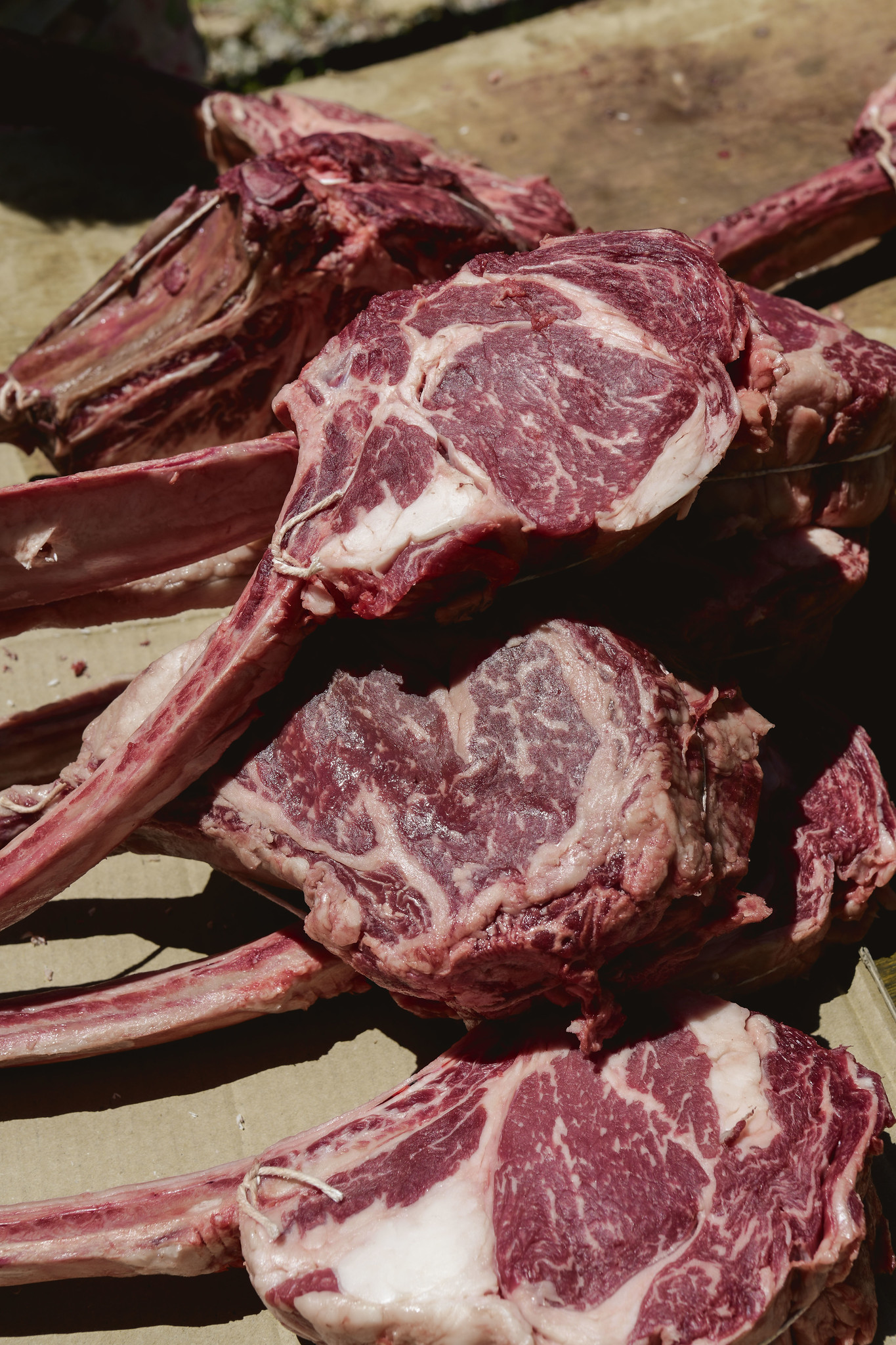 Raw tomahawk steaks